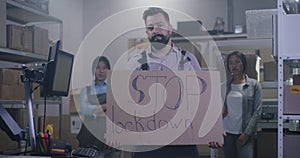 Man holding anti-lockdown message