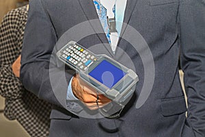 Man Holding Barcode Scanner