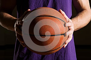 Man holding basketball