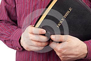 Man Holding a Bible