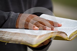 Man holding a Bible