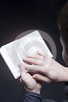 Man holding bible with glow effect