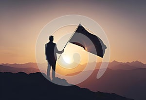 man holding a black flag overlooking the sun at sunset or sunrise