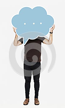 Man holding a blank speech bubble symbol