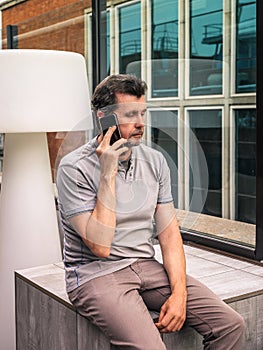 Man holding a boring conversation