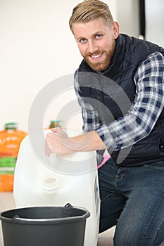 man holding bottle water