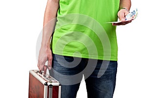 Man holding a briefcase and money