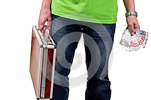 Man holding a briefcase and money