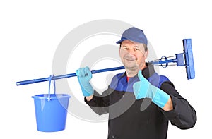 Man holding broom and bucket.