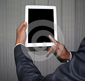 Man holding and browsing tablet pc blank screen