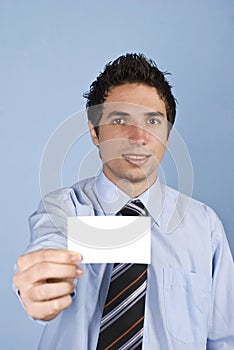 Man holding a business card