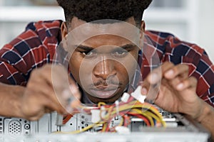 Man holding cables in hand