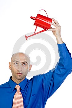 Man holding can over head