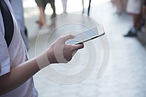 A man holding a cellphone