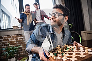 Man holding chess board