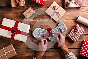 Man holding Christmas presents