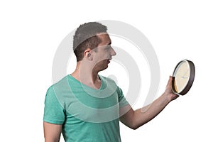 Man Holding A Clock Over White Background