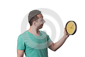 Man Holding A Clock Over White Background