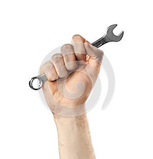 Man holding combination wrench isolated on white, closeup