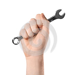 Man holding combination wrench isolated on white. Plumbing tools