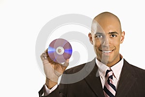 Man holding compact disc.