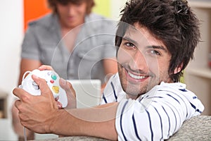 Man holding control pad