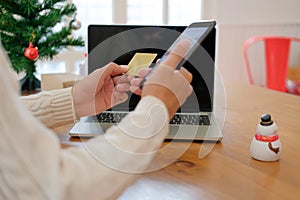 man holding credit card & smart phone for online shopping. male