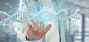 Man holding a 3d rendering data coded Dna with binary file around