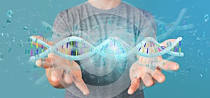 Man holding a 3d rendering data coded Dna with binary file around