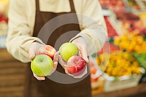 Man Holding Delicious Apples Close up