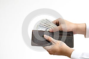 Man holding dollar banknote.young businessman holding money.Business and finances making and saving money concept