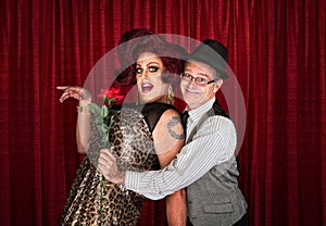 Man Holding Drag Queen