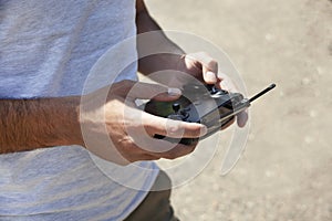 Man holding drone remote control