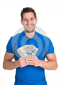 Man holding fanned us paper currency