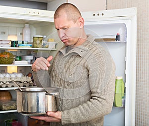 Man holding foul food