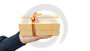 Man holding a gold gift box on a white background