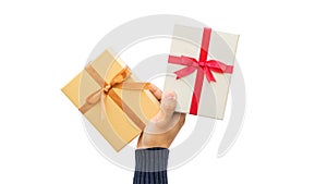 Man holding a gold and silver gift box on a white background