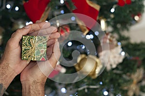 Man holding green gift box