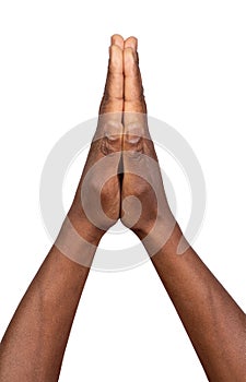 Man holding hands together in symbol of prayer and gratitude i