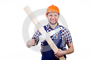 Man holding handsaw and plank photo