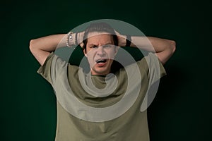 Man Holding Head in Frustration
