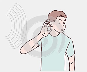 Man holding his ear to listen, hand over ear listening and hearing to rumor or gossip.