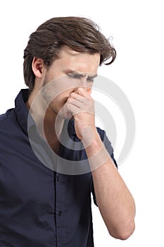 Man holding his nose because of the stink