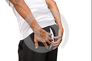 Man holding his pants. Pants cracked and show white panties.