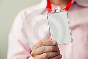 Man holding ID card