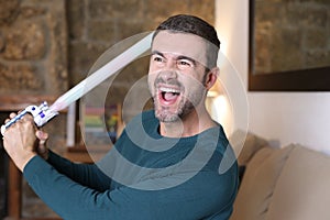 Man holding a laser sword