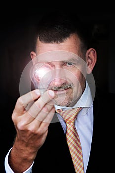 Man holding a lightbulb