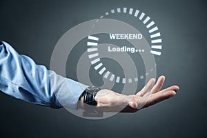 Man holding loading icon. Weekend loading concept