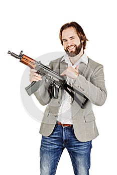 Man holding a machine gun isolated on white background