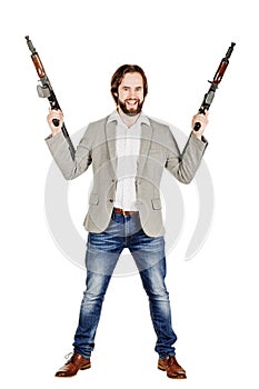 Man holding a machine gun isolated on white background